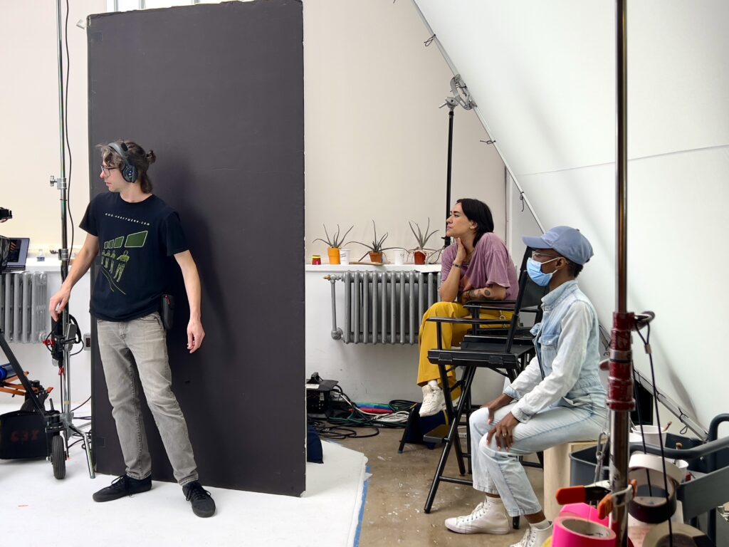 Image of Sidney and others on set: hot takes on the creative process.