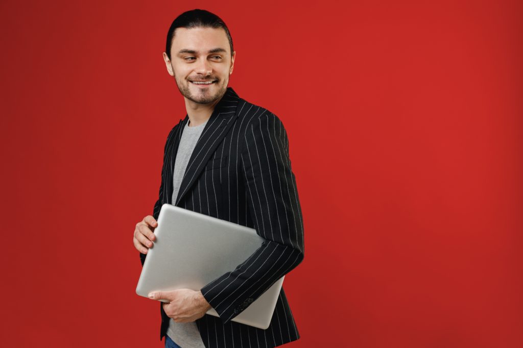 Man Holding A Notebook