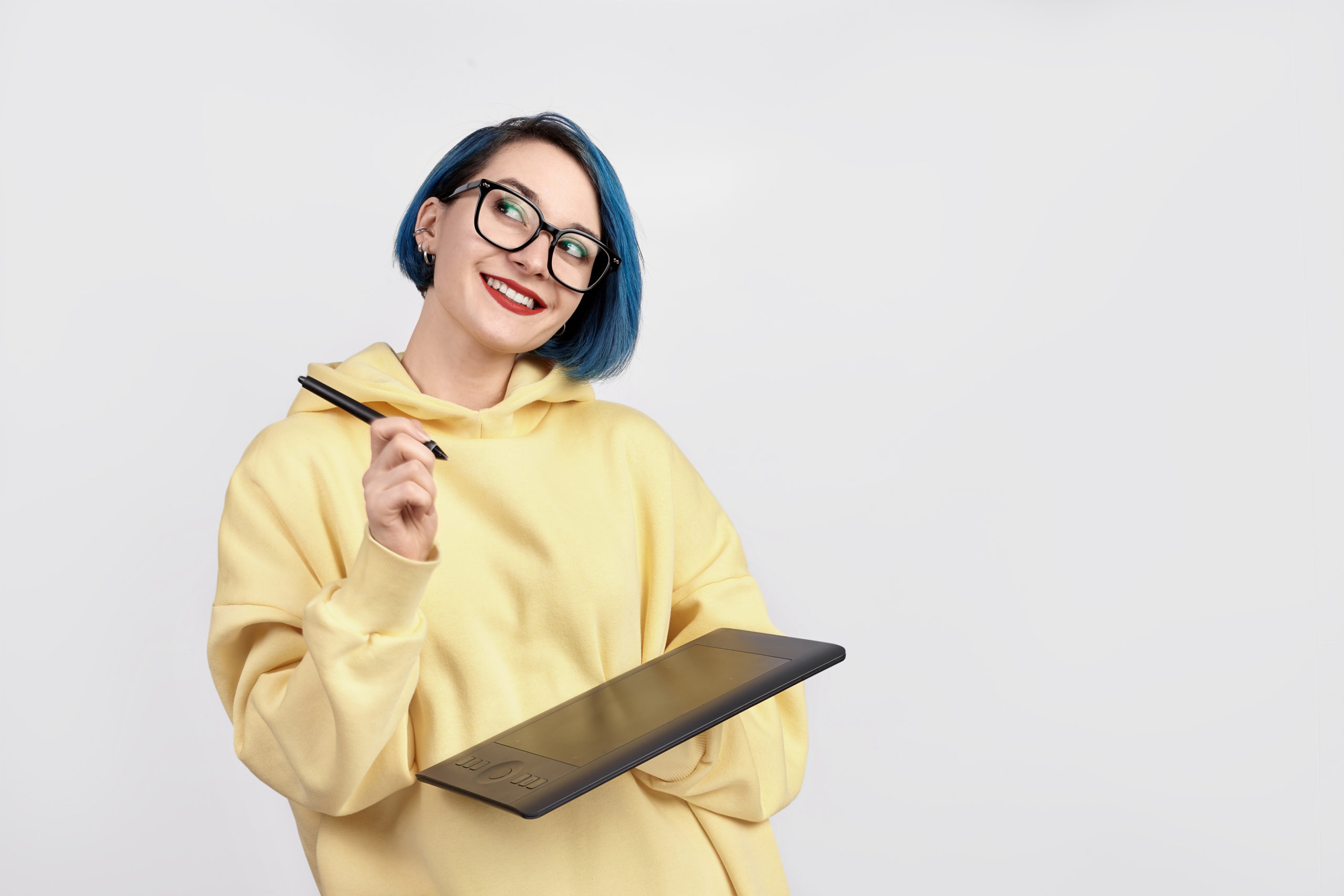 Female Model Holding A Tablet